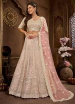 Net Peach Bridal Wear Embroidery Work Readymade Lehenga Choli